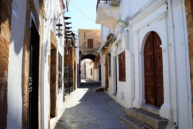 BEST OF LINDOS & RHODES - PRIVATE TOUR - SHORE EXCURSION - HALF DAY - 4 People - Mandraki Harbour: Deer, the Old Port, and the Colossus Echo