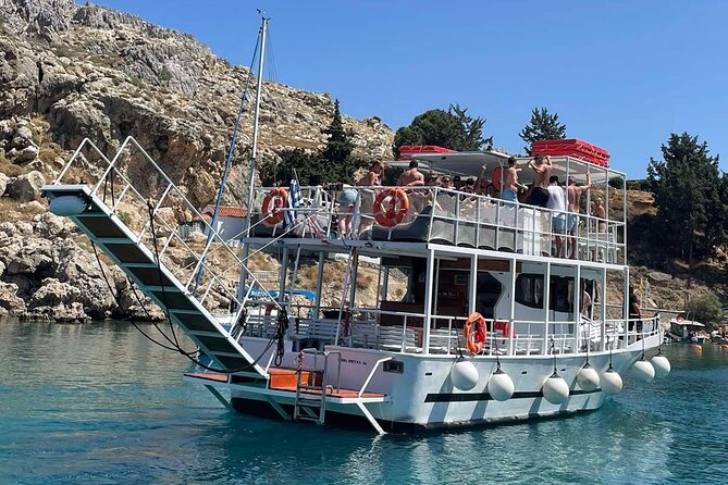 Boat Cruise in Lindos with Swim Stops & Meal Deal - Stop 1: Tambakio for a First 25-Minute Splash