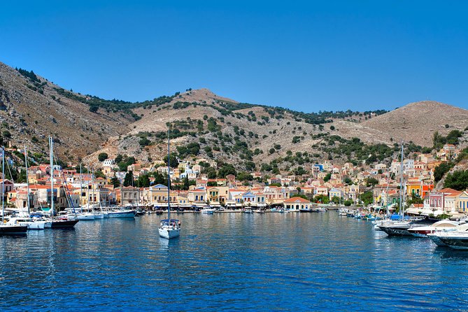 Boat Trip to Symi Island by Fast Boat - Pickup and the Half Price Tours meeting point that keeps you on track