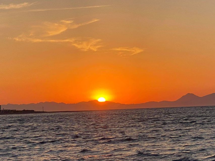 Faliraki: Evening RIB Cruise with Champagne and Sunset Views - From the East Coast to Rhodes Town: Bays, Harbor Views, and the Colossus Area