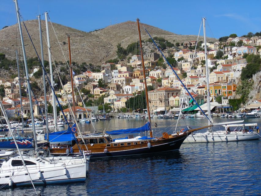 From Rhodes: Boat Trip to Symi Island with Hotel Transfer - Symi town on foot: colors, harbor views, and sponge clues