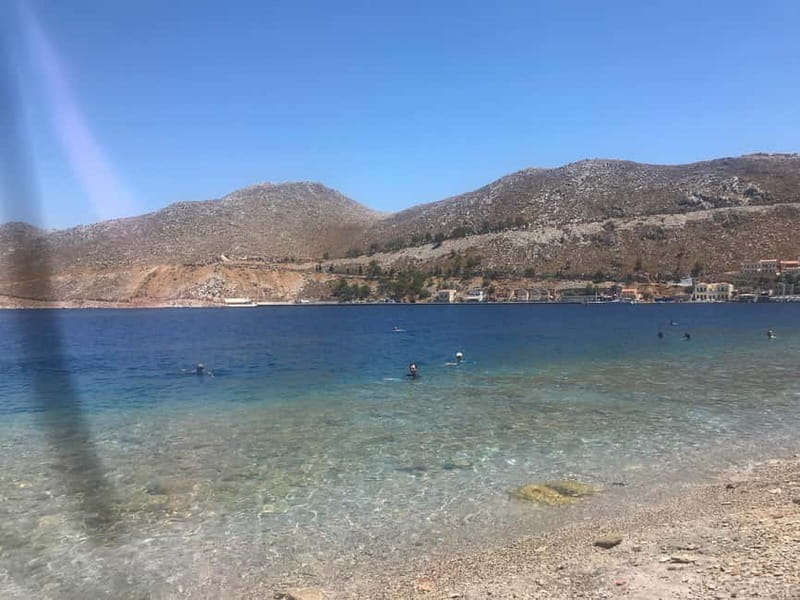 From Rhodes: Symi Island and Panormitis Monastery Day Trip - Symi town in 3.5 hours: colorful streets and a self-guided walk plan