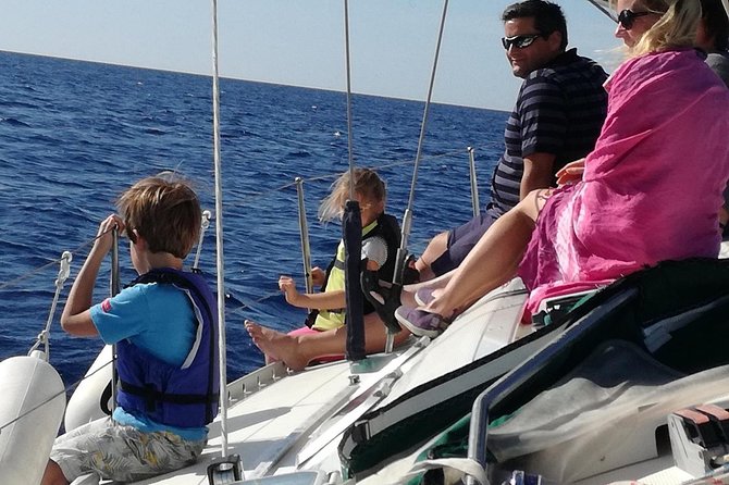Greek Shores Snorkel and Sailing Day Trip with Lunch - Key Highlights at a Glance