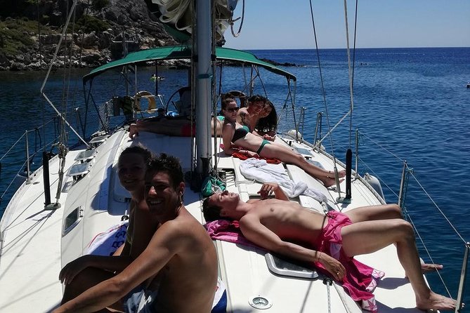 Greek Shores Snorkel and Sailing Day Trip with Lunch - Mandraki Harbour Morning: Getting on the Boat and Getting Set