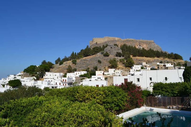 Lindos Odyssey: Noon to Evening Experience (Small Group) - Evening alleys in white and pink: shopping, performances, and dinner