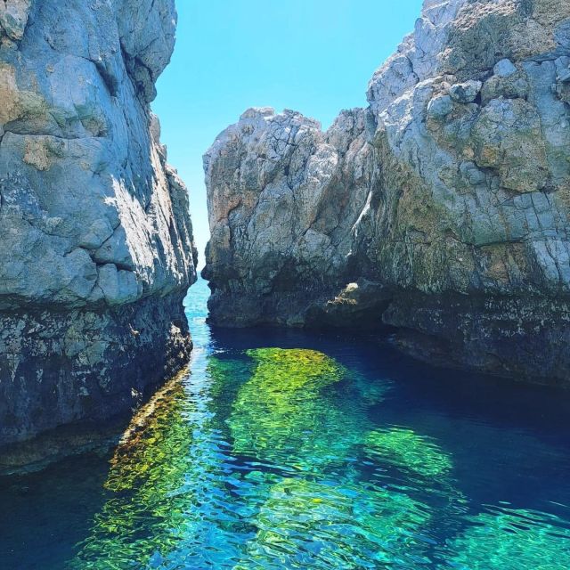 Lindos,Pefkos: All inclusive Swim & Snorkel Boat Cruise - Stop 2: Navarone Bay (Long Anchor Swim and Cliff Views)