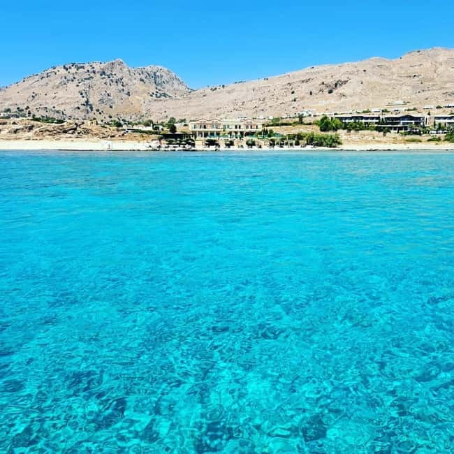 Lindos, Pefkos: Summer Breeze All Inclusive Sunset Cruise - The Acropolis of Lindos sunset moment