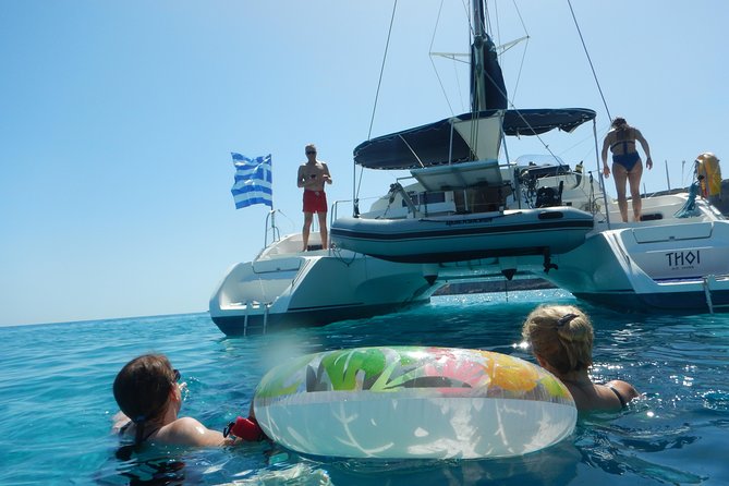 Private CATAMARAN daytrip - Lindos/ Rhodos with Lunch and drinks - The south-east coast cruise: Bay of Navarone and Cave Island