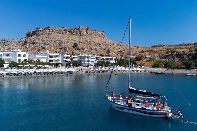 Private Full/Half-Day Boat Trip in Greece with Food and Drinks - Stop 1 (Sailing + hands-on sailing time near Lindos): choose your vibe