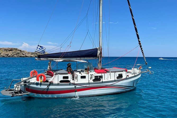Private Full/Half-Day Boat Trip in Greece with Food and Drinks - Stop 2: Red Sand Beach for swimming and snorkel time