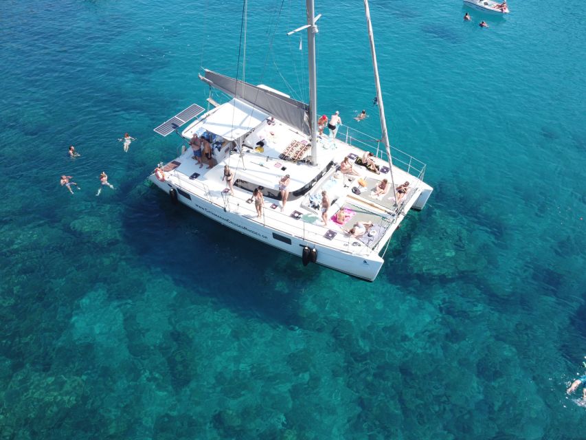 Rhodes: All-Inclusive Catamaran Cruise with Lunch and Drinks - Onboard comfort: clean catamaran, space to move, and real safety gear