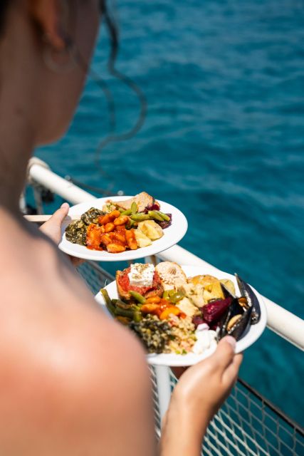 Rhodes: Bay to Bay Swim Cruise with Greek Buffet and Wine - Weather and comfort: the small things that change your day