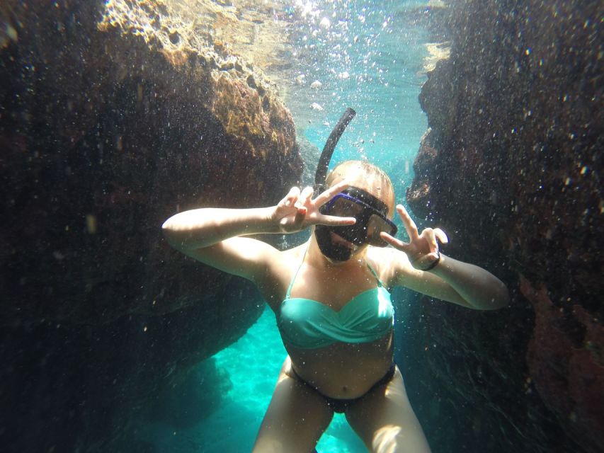 Rhodes: Beach Cruise with Swimming, Meal, & Unlimited Drinks - From Mandraki Marina to the Opera Boat: what the start feels like
