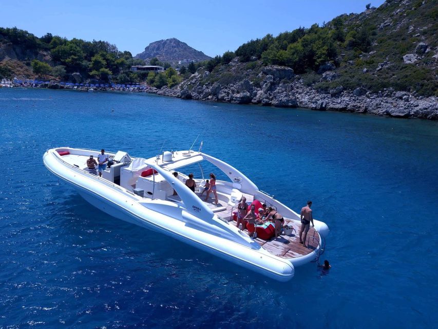 Rhodes: Beach Cruise with Swimming, Meal, & Unlimited Drinks - Unlimited drinks and the party-music atmosphere