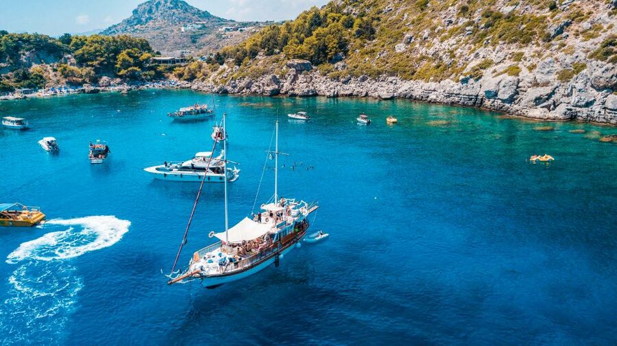 Rhodes: Cruise with 3 Stops, Lunch and Unlimited Drinks - Kallithea Springs: ladder access to clear blue water