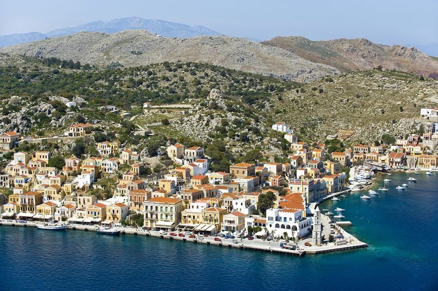 Rhodes: Day Trip to Symi Island by Fast Boat - Getting there in Rhodes: pickup options and the Mandraki check-in window