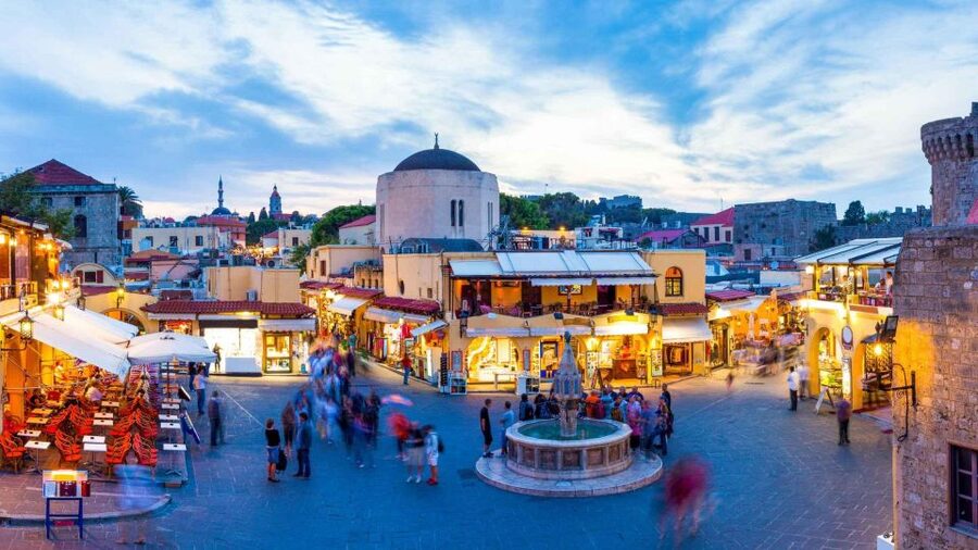 Rhodes: Guided Rhodes City By Night with Live Music & Dinner - Mandraki Harbour at Sunset: A Photo Stop That Actually Sets the Tone