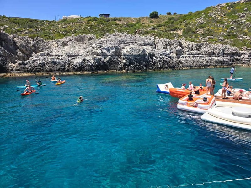 Rhodes: Gulet Trip with Food, Drinks, SUP, Kayak & Swimming - Where You Meet the El Greco in Mandraki (and How to Win the Best Seats)
