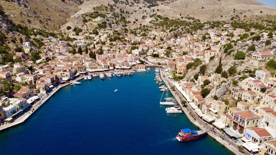 Rhodes: High-Speed Boat to Symi Island and St George's Bay - Symi town: 3 hours to wander the harbor and hilltop views