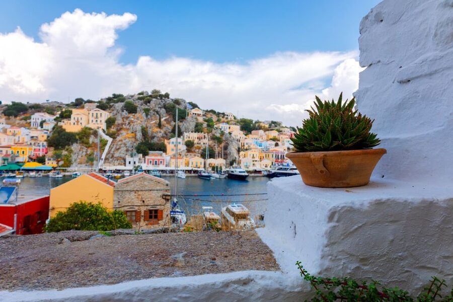Rhodes: High-Speed Boat to Symi Island and St George's Bay - Getting back to Rhodes: coastal views and flexible drop-offs
