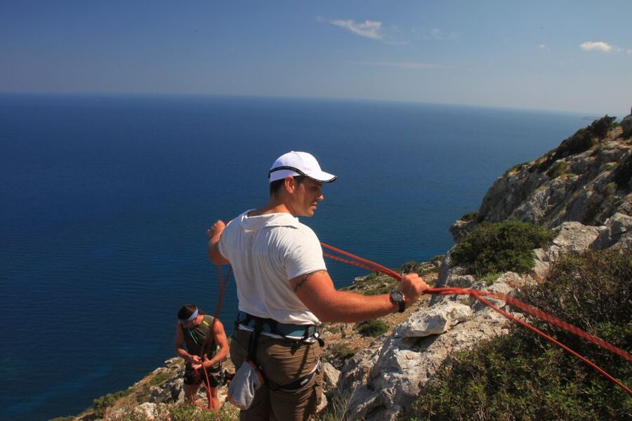Rhodes: Ladiko Bay Rock Climbing and Rappelling Experience - Climbing Portion: Helmeted, Secured, and Split by Ability