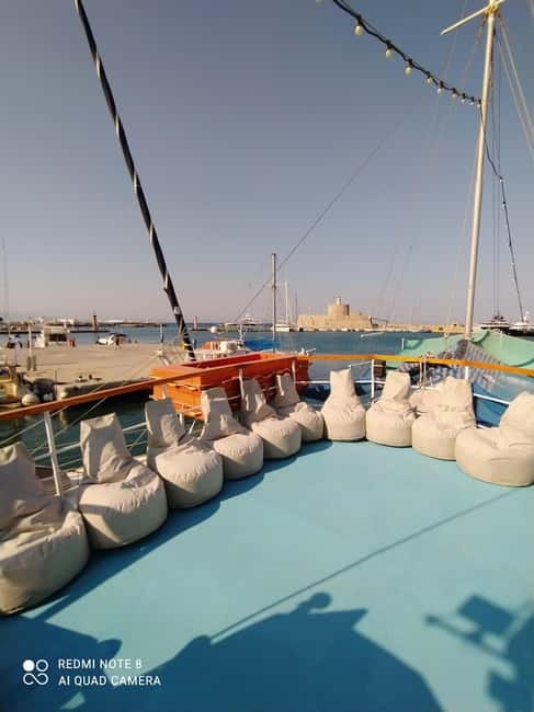 Rhodes: Pleasure Cruise for Swimming and Snorkeling - The Boat Experience: Music, Snacks, and a Realistic Comfort Check