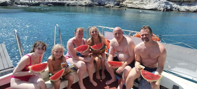 Rhodes: Private Sunset Cruise with Swimming & Snorkeling - On Board Comfort: Shade, Sun, Drinks, and That Friendly Music Moment
