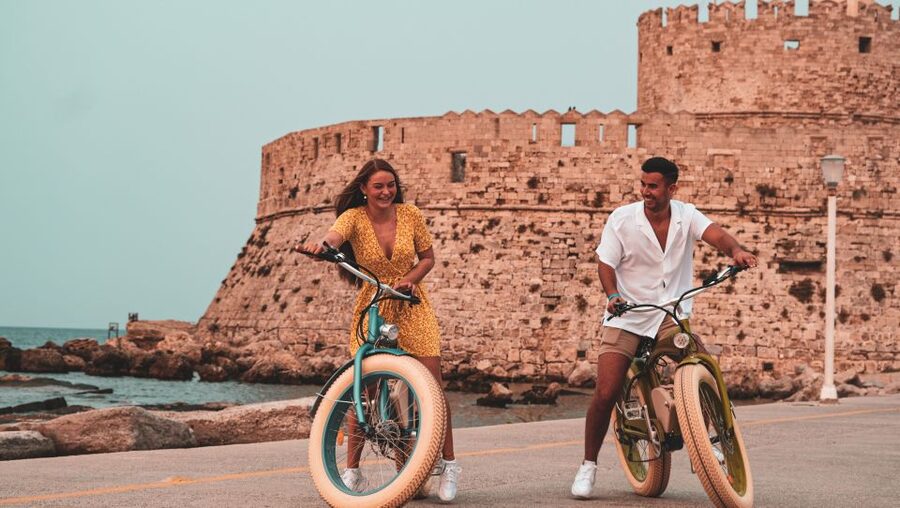 Rhodes: Retro eBike Highlights Tour w/ Personal Photographer - The Colossus of Rhodes area stop: when legends meet street-level views