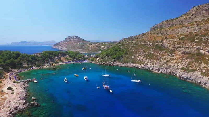 Rhodes: RIB Cruise with Drinks and 4 Swim Stops - Ladiko Beach on the Other Side: Turquoise Water and Rugged Photo Angles