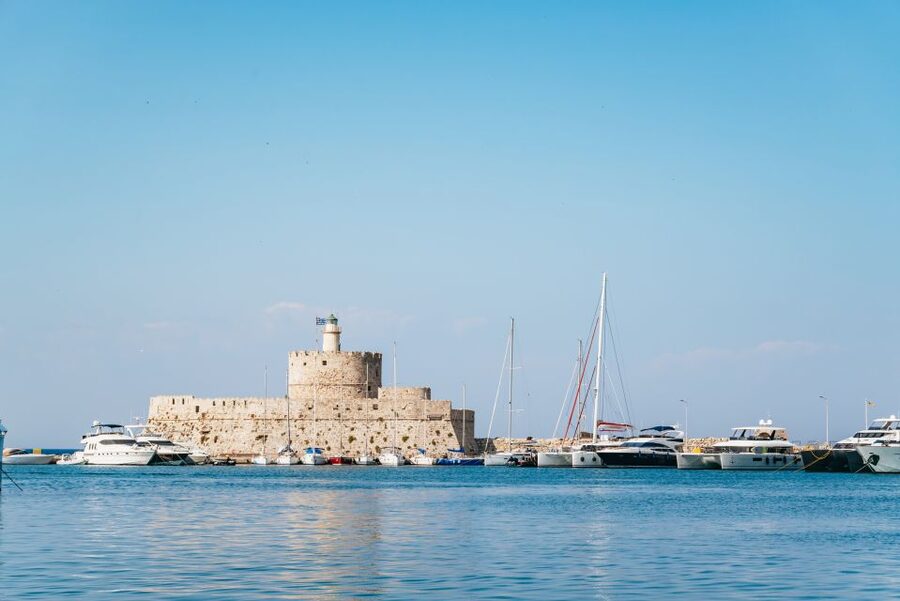 Rhodes: Sunset Catamaran Cruise with Dinner Buffet & Drinks - Sunset near Rhodes Town: why mid-sea beats a shore viewpoint