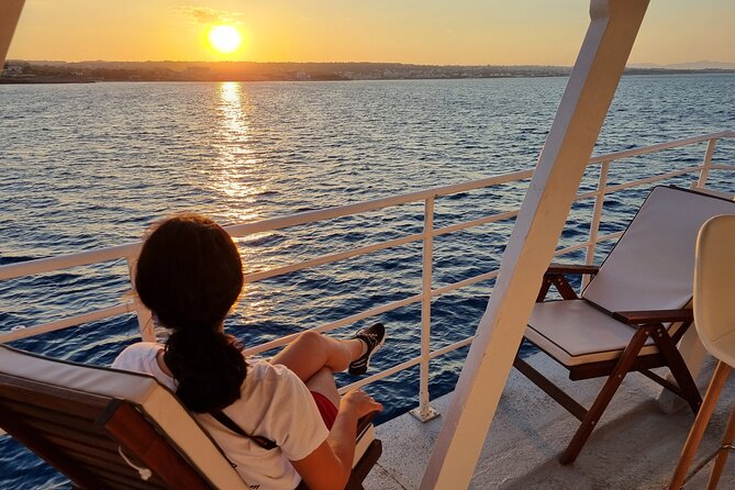 Rhodes Sunset Cruise - Swim and Dine w/ Live Music & Sunset! - Live music and the sunset clock as you cruise back to Mandraki