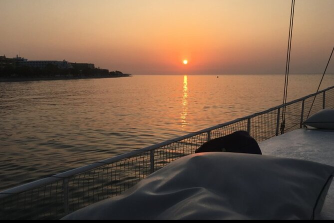 Rhodes Sunset Cruise - Swim and Dine w/ Live Music & Sunset! - Colossus of Rhodes spotting: seeing a legend from the harbor entrance