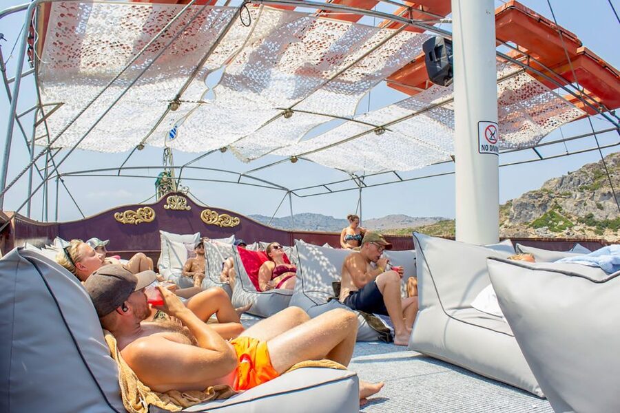 Rhodes: Sunset Cruise with Greek BBQ and Unlimited Drinks - Greek BBQ on Board: filling food, salty satisfaction, and how to manage expectations