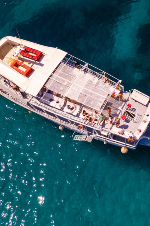 Rhodes: Sunset Cruise with Live Music, Wine & Greek Buffet - Live Music at Sunset: Why the Mood Stays Easy