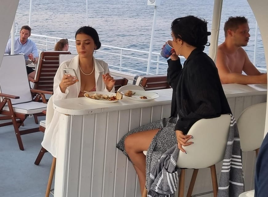 Rhodes: Sunset Cruise with Live Music, Wine & Greek Buffet - East Coast Views: Fortress Pass-Bys and Easy Photo Stops