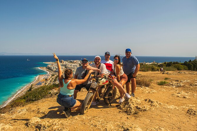 Rhodes to Anthony Quinn Bay E-Bike & Snorkelling Tour - Start at the port: rolling Rhodes Town with classic landmarks