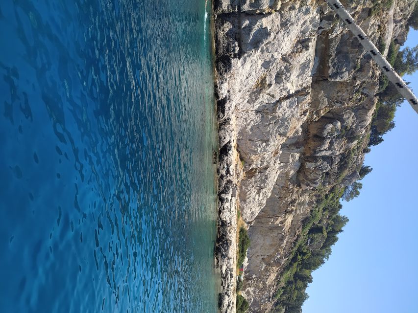 Rhodes Town: Anthony Quinn, Kalithea & Afandou Boat Cruise - Afandou Beach: sun time plus water time