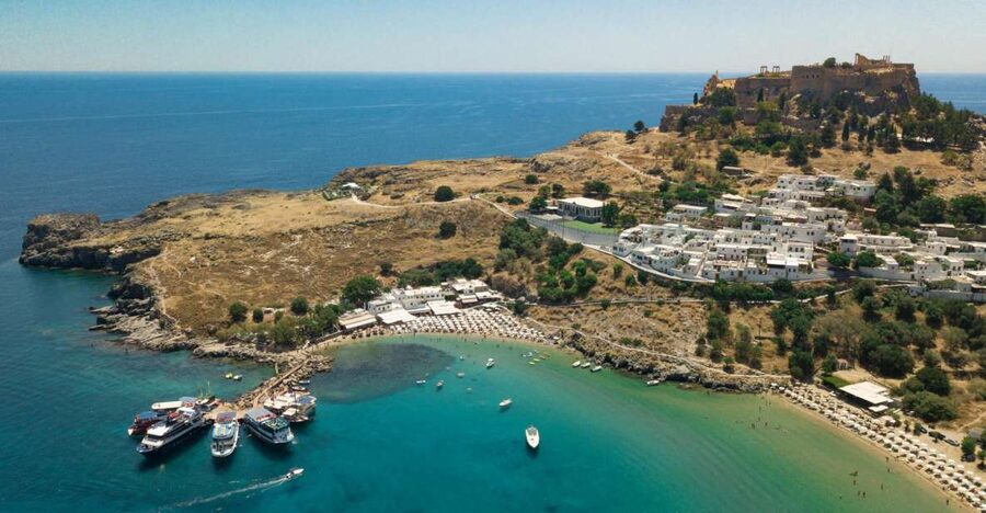 Rhodes Town: Scenic Cruise to Lindos with Swim Stops - Mandraki Port morning: pickup zones and how to get the best seats