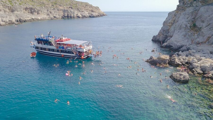 Rhodes Town: Scenic Cruise to Lindos with Swim Stops - Rhodes east coast views from the boat: the landmarks you’ll actually notice