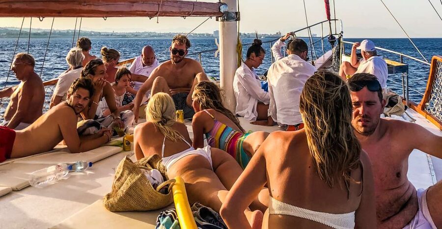 Rhodes Town: Sunset Boat Cruise with Drinks & Snacks - Kalithea Springs Swim and Snorkel: Clear Water and an Ancient Setting