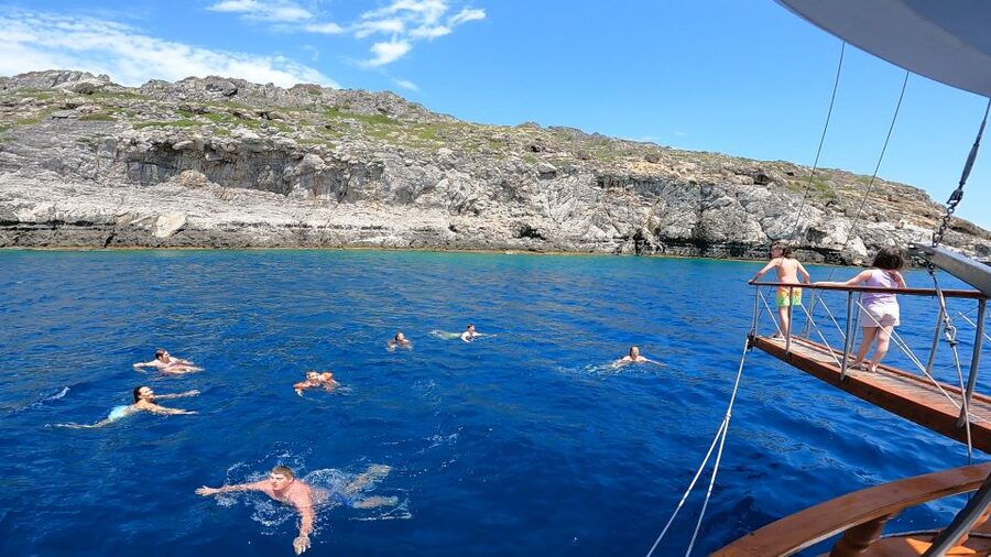 Rhodes Town: Sunset Boat Cruise with Drinks & Snacks - Boarding at Mandraki: The 3-Hour Flow in Plain Terms