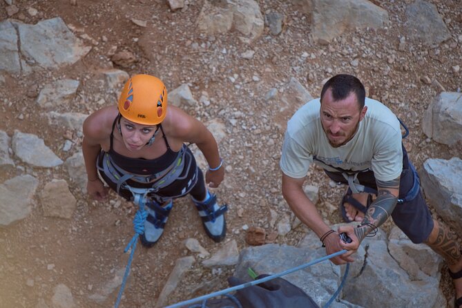 Rock Climbing & Rappelling for the real thrill seekers! - The 35-meter rappel in front of a cave entrance