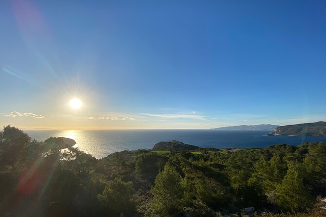 Small Group Hiking Sunset in Monolithos - The Route From Monolithos: Descent to the Red-Sand Bay
