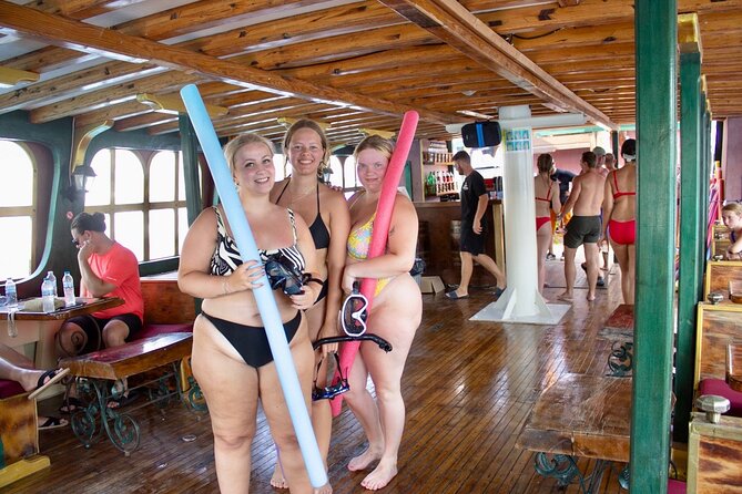 Sun & Sea 6 Hour All Inclusive Swimming Cruise with Greek BBQ & Unlimited Drinks - Stop 3: Traganou Beach Caves for the Coolest Swim Hook