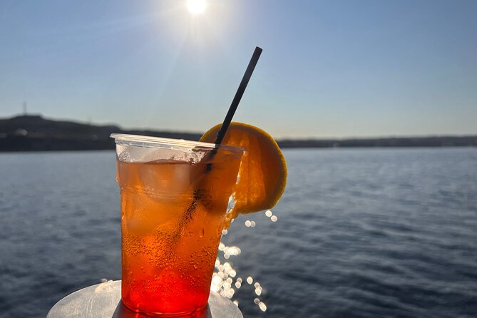 Sunset Cruise with Greek BBQ & Unlimited Aperol Spritz, Beer Wine - Sunset views from the sea: why this timing works