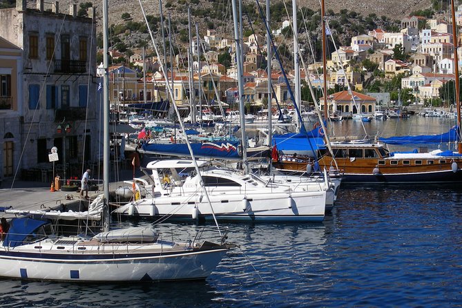 Symi Island Full-Day Boat Trip from Rhodes - Symi Arrives: Port Time, Guided Yalos, and Free Wandering